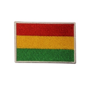 May include: A red, yellow, and green embroidered patch with a white border. The patch is a representation of the Bolivian flag.