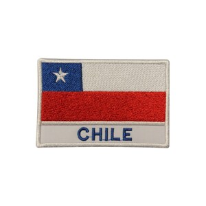 May include: Embroidered patch featuring the flag of Chile. The design includes a blue square with a white star, a white stripe, and a red stripe. The word "CHILE" is embroidered in blue.