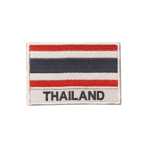 May include: An embroidered patch featuring the flag of Thailand. The patch is white with a red, white, and blue striped flag in the center. The words "THAILAND" are printed below the flag.