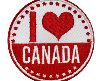May include: A red and white embroidered patch with a heart and the text "I love Canada".