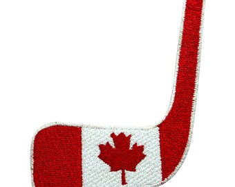 May include: Red, white, and red hockey stick shaped patch with a Canadian flag design. The flag features a red maple leaf on a white background.