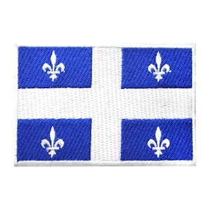 May include: Embroidered patch depicting the flag of Quebec. The design features a white cross on a white background, with four blue squares. Each blue square contains a white fleur-de-lis emblem.