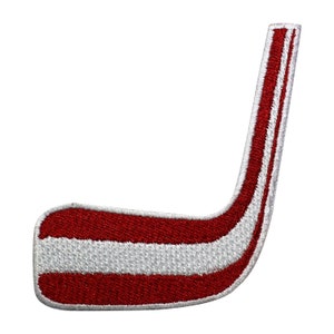 May include: Red and white hockey stick patch with white stitching.