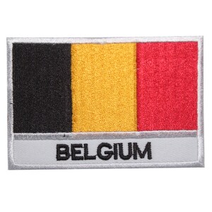 May include: A black, yellow, and red embroidered patch with the word "BELGIUM" written in black below the flag.