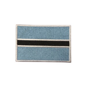 May include: A blue and black embroidered patch with a white border, depicting the flag of Botswana.