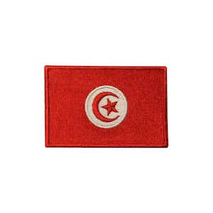 May include: A red embroidered patch with the flag of Tunisia. The flag features a white circle with a red crescent moon and a white five-pointed star.