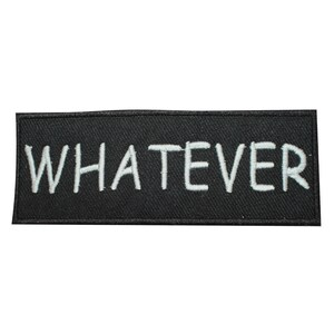 May include: Black embroidered patch with white text that reads "WHATEVER".