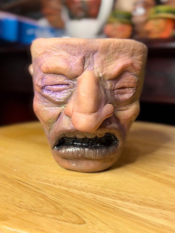 Ugly Mugs are hand made sculptures on  Ceramic mugs,  Get a scary halloween decor, Ceramic mug with one of a kind face sculpture today!