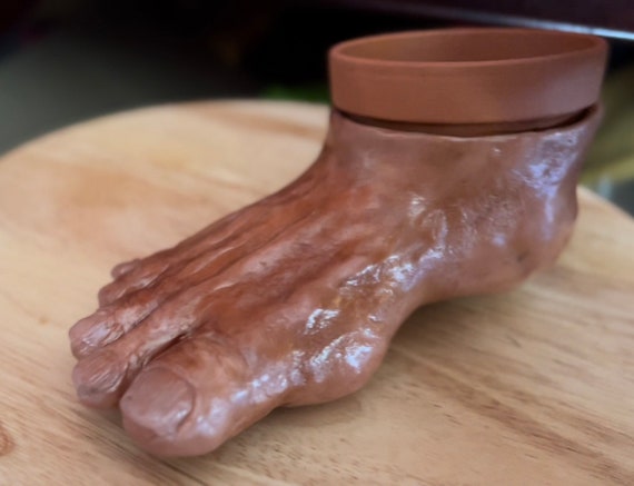 Let’s play footsie‘s! Terracotta planter with hand made unique one-of-a-kind hand-made sculpture in the shape of a foot!