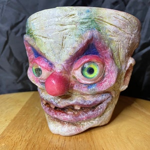 Handmade Fugly Clown Face Sculpture on Terracotta Planter – Unique Polymer Clay Pot – Funny Garden Gift or Halloween Decoration