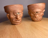 Terra-cotta pot “twin” cyclops planters hand made unique sculptures