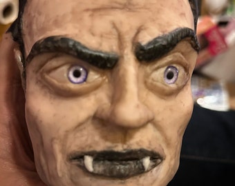 The count, Monster Mug, a one-of-a-kind sculpture of classic horror style sculpture.
