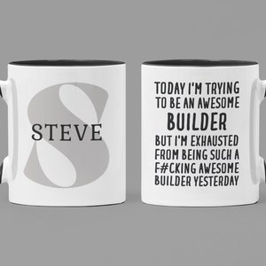 May include: Two white coffee mugs with black handles and black rims. The mug on the left has a large grey letter "S" with the name "STEVE" printed below it. The mug on the right has the text "TODAY I'M TRYING TO BE AN AWESOME BUILDER BUT I'M EXHAUSTED FROM BEING SUCH A F#CKING AWESOME BUILDER YESTERDAY".