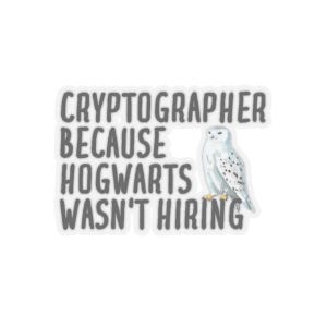 May include: A white sticker with a gray owl and the text "Cryptographer because Hogwarts wasn't hiring."
