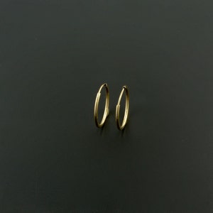 Or jaune 14 carats | Créoles polies sans fin de 14 mm de haut | 1/2 po. de diamètre | Fermeture à pression | 1 jour | Coffret cadeau inclus Actif