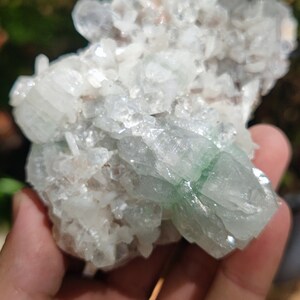 Greenish apophyllite on pink matrix