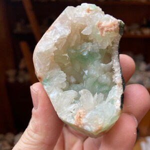 Green apophyllite geode with stilbite