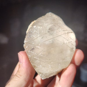 Apophyllite crystals in perfect calcite crystal