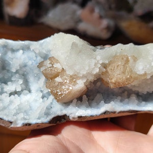Doubly terminated calcite cluster on chalcedony matrix