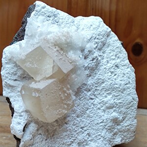 Transparent calcite and stilbite crystals on matrix