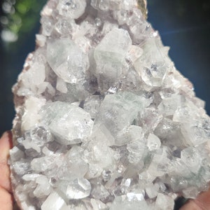 Greenish apophyllite on pink matrix