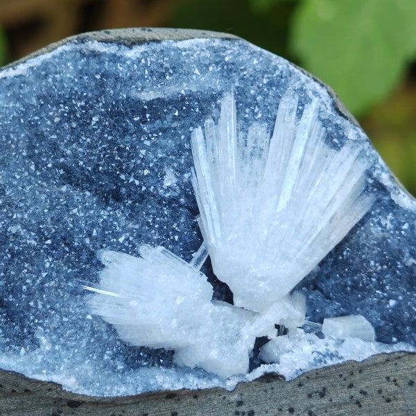 Scolecite geode on dark background