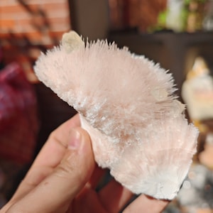 Pink natrolite on matrix with calcite crystals