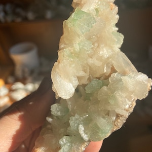 Green apophyllite geode with stilbite