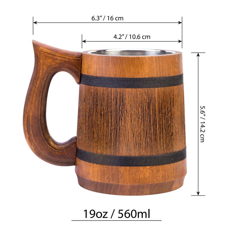 May include: A wooden beer stein with a stainless steel liner. The stein is brown with black bands around the top and bottom. It measures 6.3 inches tall, 4.2 inches wide, and 5.6 inches in diameter. The stein holds 19 ounces or 560 milliliters.