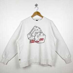 May include: White sweatshirt with a graphic of dice and the text "ECKO FUNCTION" in red and black.