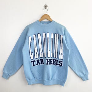 90s Distressed NCAA University of North Carolina ‘Tar Heels’ Crewneck Sweatshirt Print Logo Blue Color Men’s L