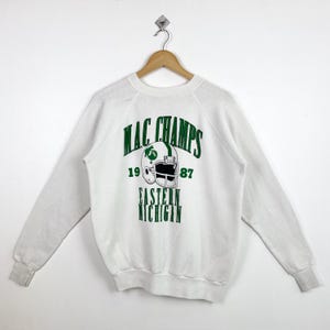 80s Distressed NCAA Eastern Michigan University ‘Eagles’ Crewneck Sweatshirt Print Logo White Color Men’s Fit to L