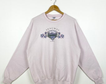 vintage Sweat-shirt Skagway Alaska ras du cou avec logo imprimé rose pour homme L
