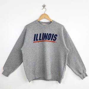Vintage NCAA University of Illinois Urbana-Champaign ‘Fighting Illini’ Crewneck Sweatshirt Print Logo Grey Color Men’s M