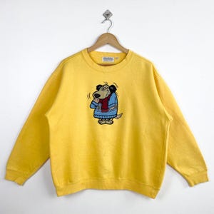 Vintage Wacky Races 'Muttley' sweater ronde hals geborduurd logo gele kleur heren L