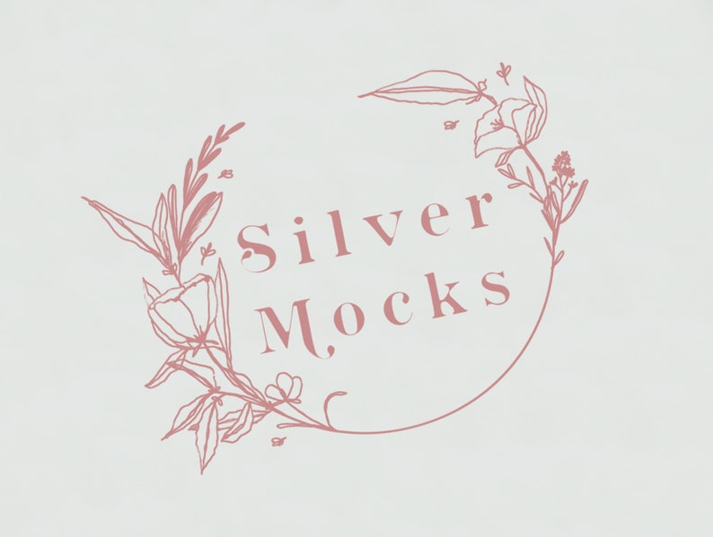 Puede incluir: Una corona floral rosa con el texto "Silver Mocks" en el centro.