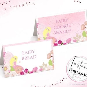 May include: Two pink printable place cards with a fairy illustration and floral border. The text on the cards reads "Fairy Bread" and "Fairy Cookie Wands".