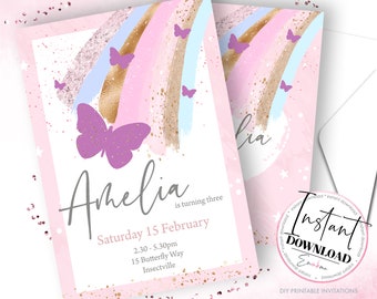 May include: Pink printable birthday invitation with a gold and pastel rainbow design and butterflies. The text reads "Amelia is turning three, Saturday 15 February, 2.30-5.30pm, 15 Butterfly Way, Insectville".