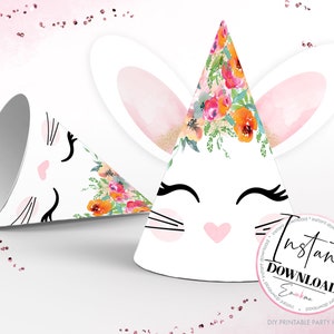 May include: White party hats with bunny face designs. One hat is upright, and the other is lying on its side. The hats feature black eyelashes, pink noses, and floral accents. The hats have the text "Instant Download" and "DIY Printable Party Hats".