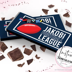 May include: Printable chocolate bar wrappers with a blue background, white text that says "JAKOBI FOOTBALL LEAGUE", and a red football with white laces. The wrappers also feature a banner of colorful flags.