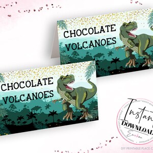 May include: Printable place cards featuring a green dinosaur with gold glitter and the text "Chocolate Volcanoes".