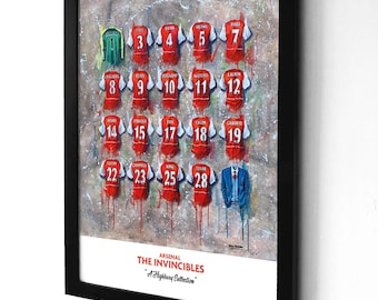 May include: A framed print of the Arsenal "Invincibles" team, featuring a collage of red and white football jerseys with player numbers. The print has a white background with the text "Arsenal The Invincibles - A Highbury Collection" at the bottom.