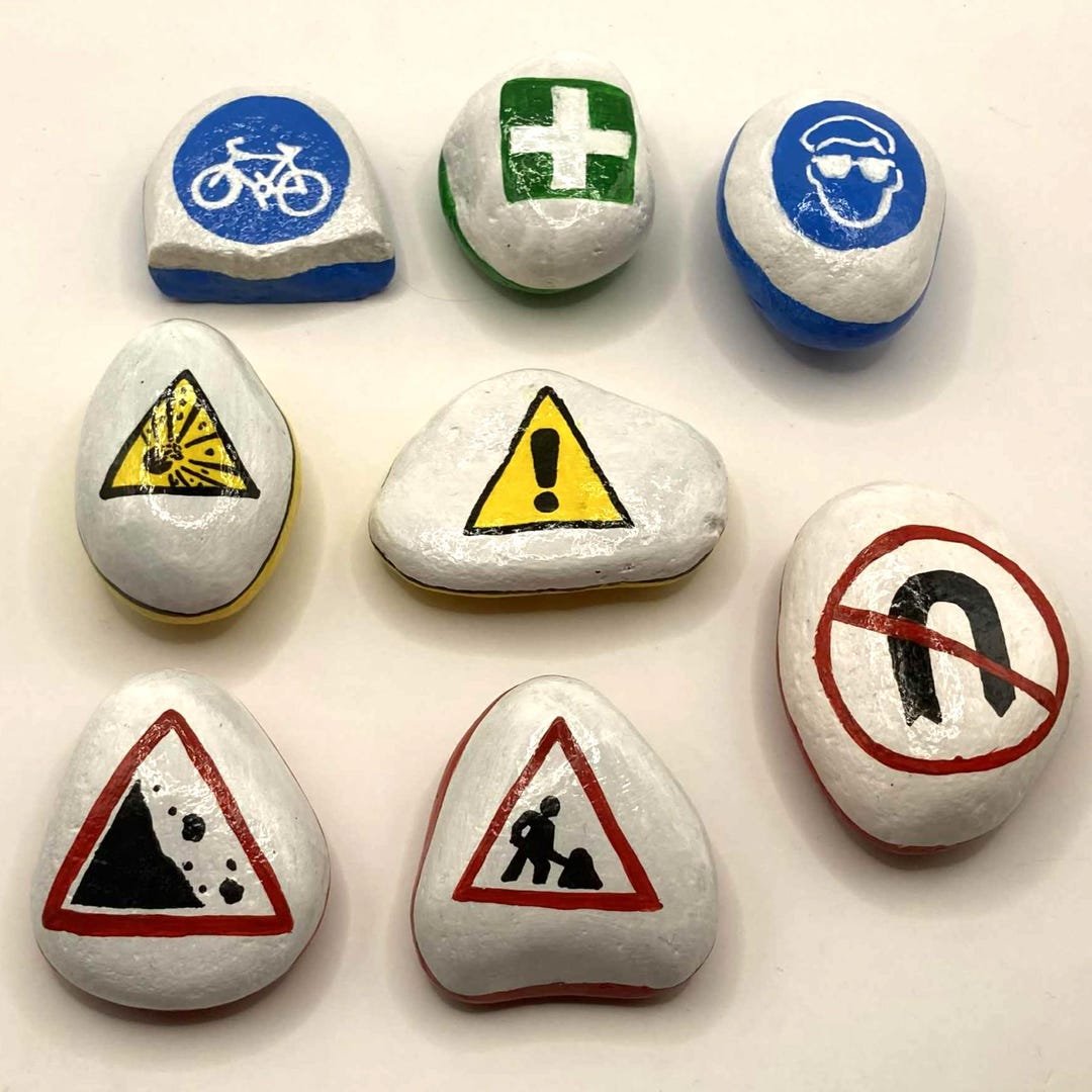 Roadworks and Safety Signs on Rocks - Painted Hazard Signs - Roadworks ...