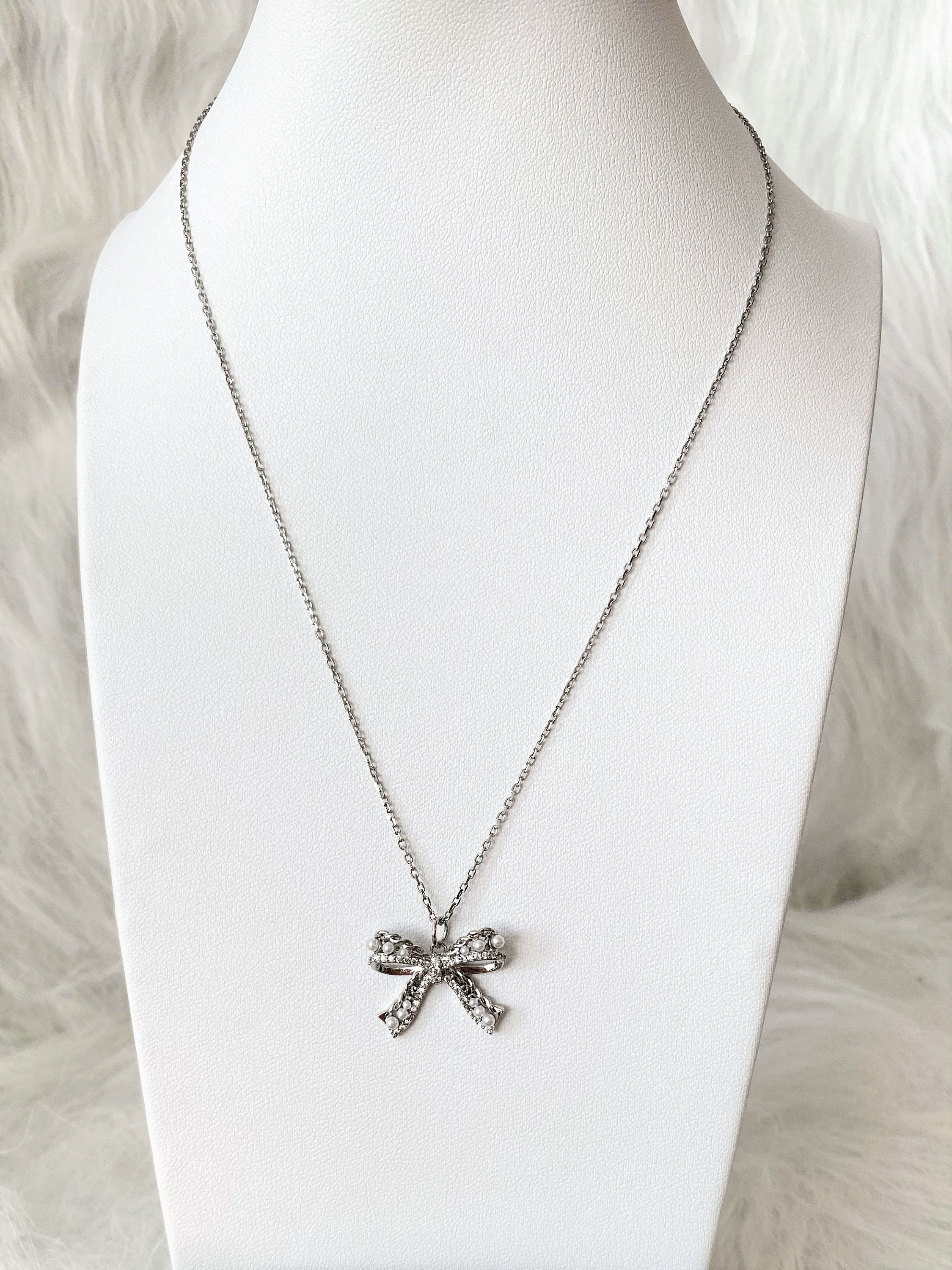 ★Hei★ sv925 silver crystal ribbon necklace HE24SMNSW750XXF Silver-tone Rhinestone Bow Y-Neck Necklace | Claire's US