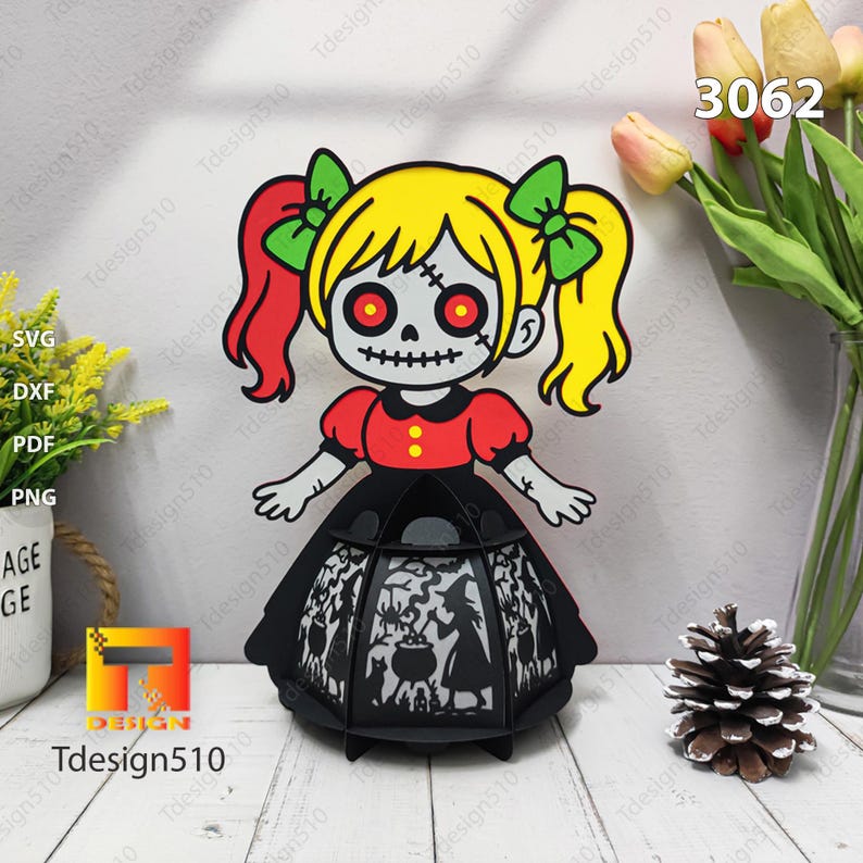 May include: A Halloween lantern with a cartoon girl design. The girl has yellow hair, red pigtails, and a zombie face. The black lantern features a witch and cauldron design. The image includes the text "SVG, DXF, PDF, PNG" and "TDesign510".