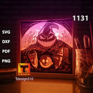 May include: A light-up 3D papercraft design featuring the character Oogie Boogie from the movie The Nightmare Before Christmas. The design is illuminated with a warm orange glow, creating a spooky and festive atmosphere. The design is framed in a white frame and includes the text "Tdesign510" and the number "1131".