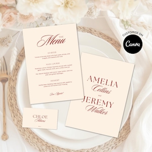 Pode incluir: Conjunto de papelaria de casamento marfim com escrita bordô. O conjunto inclui um menu, cartões de mesa e um cartão de nome. O menu lista as opções de entrada, prato principal e sobremesa. O cartão de visita diz "Amelia Collins and Jeremy Walker."