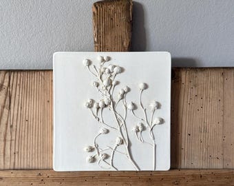 Rosa agrupada, relieve vaciado en yeso