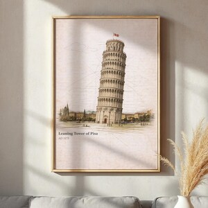 Op de afbeelding: Een ingelijste print van de scheve toren van Pisa, een architecturale illustratie in vintage stijl. De toren is gedetailleerd afgebeeld met een rode vlag aan de top, tegen een lichte achtergrond. De tekst "Leaning Tower of Pisa AD 1173" staat onderaan.