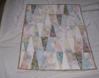small quilt pastel colors geometric shapes